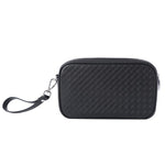 THE SIGNATURE CLUTCH